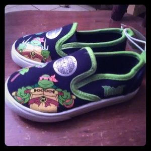 Teenage Mutant Ninja turtles size 6 shoes.